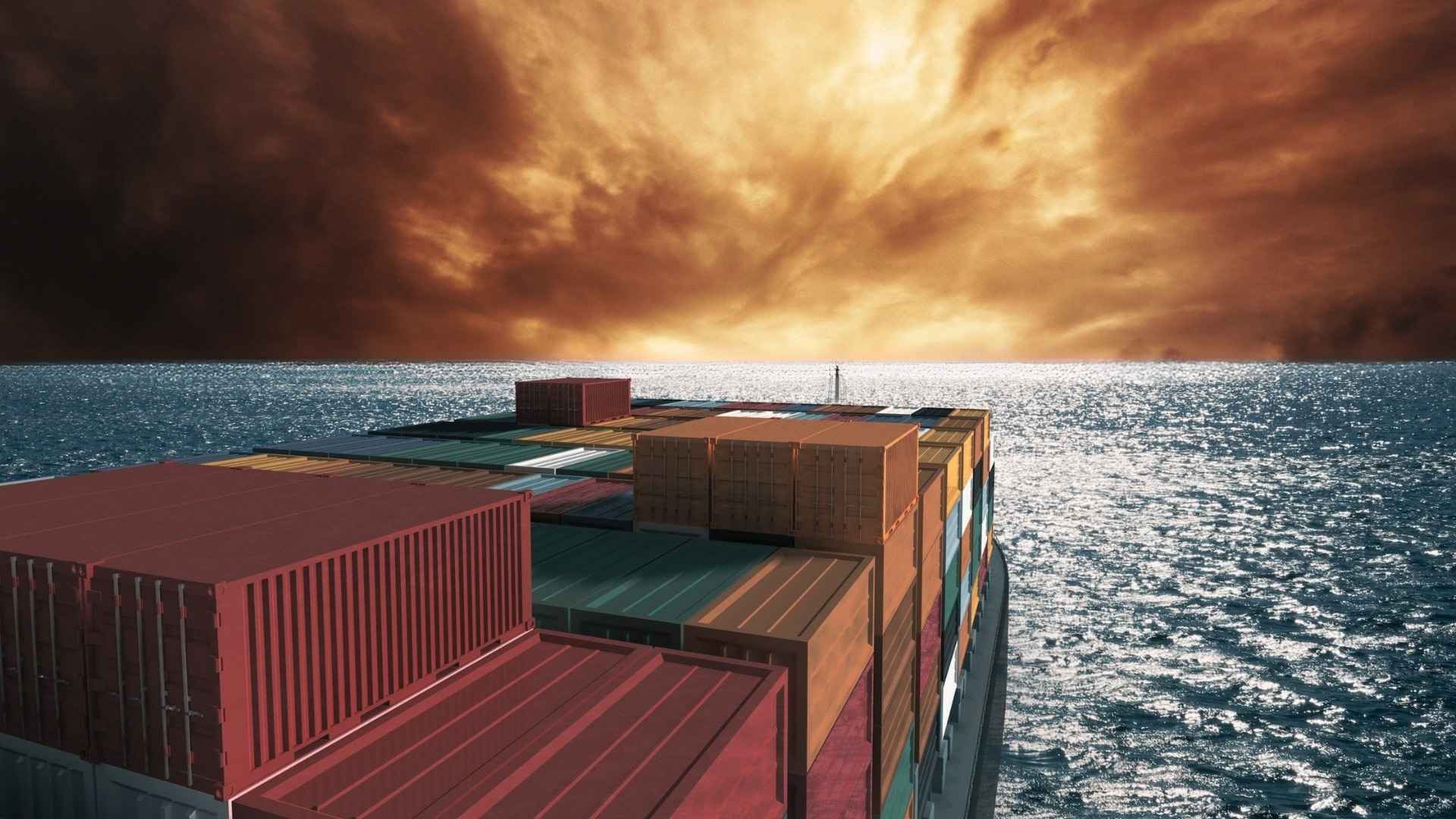 Statek transportowy z kolorowymi kontenerami zmierzający w stronę wzburzonego horyzontu