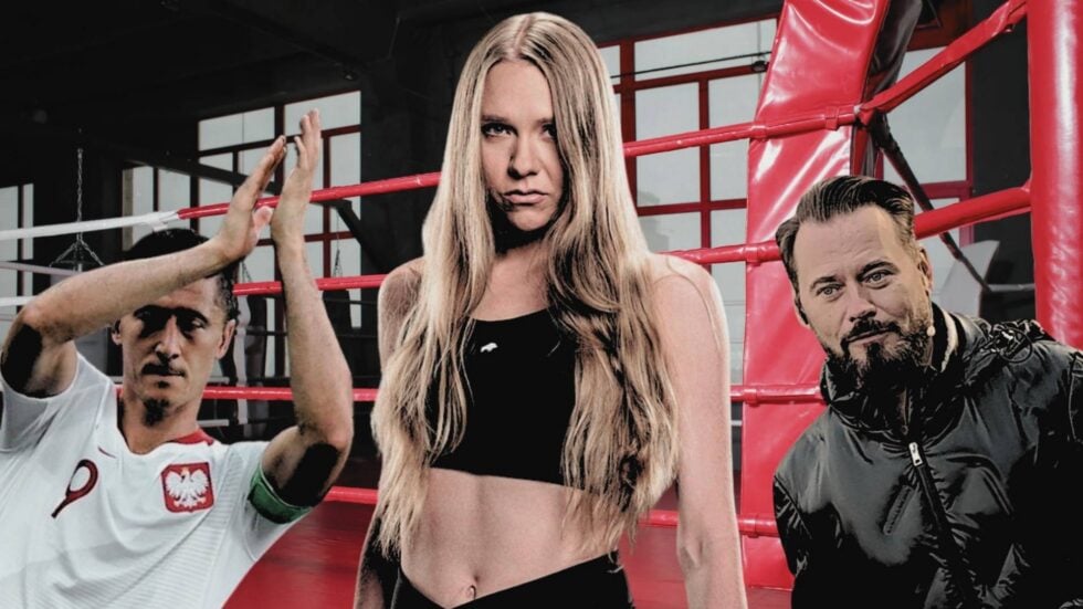 Na środku Maja Staśko (zdjęcie z materiałów prasowych High League MMA), po lewej bijący brawo Robert Lewandowski z stroju reprezentacji Polski, po prawej Krzysztof Stanowski, w tle czerwony ring boksterski