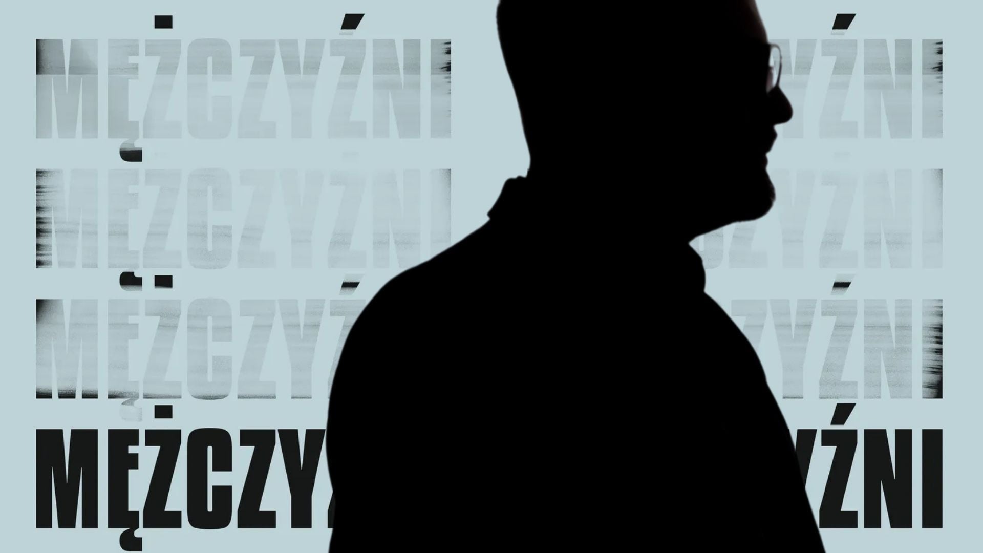 Cień mężczyzny w okularach na tle okładki książki Michała Gulczyńskiego (blado niebieskie tło i znikający napis "mężczyźni"