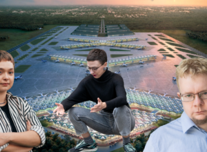 Three people in the foreground pose in front of a large airport with multiple taxiways and terminal buildings visible in the background during sunset/ twilight.