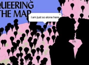 Two silhouetted people kissing in front of a colorful map background with the phrase 'QUEERING THE MAP' and a speech bubble that reads 'i am just so alone here'