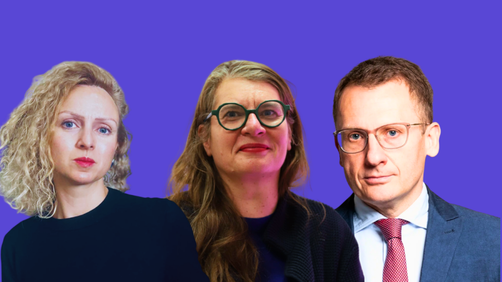 Three professionals posing together against a purple backdrop: left a curly blonde woman, center a woman with green glasses, right a man in a suit and tie.